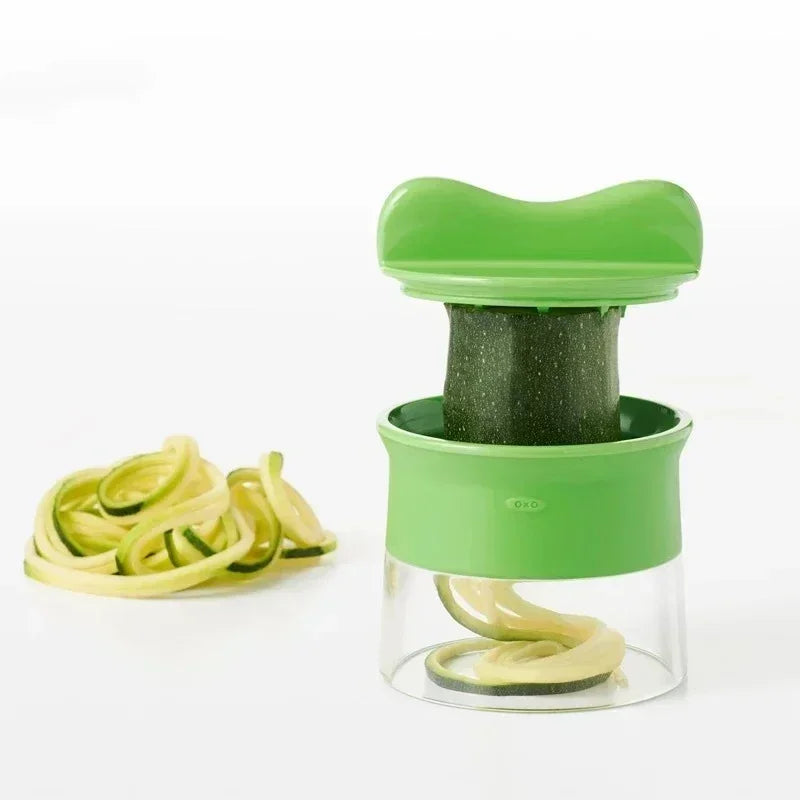 "Handheld Spiralizer Vegetable Slicer - Adjustable Grater for Salads"