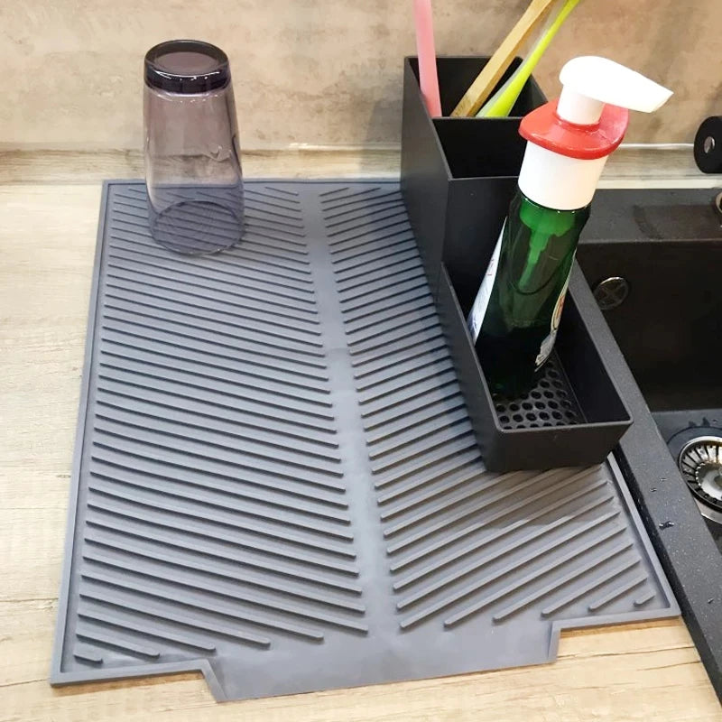 "Silicone Drain Pad Rack - Durable Kitchen Mat for Drying and Protection"