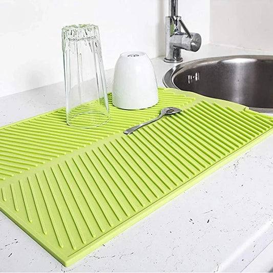 "Silicone Drain Pad Rack - Durable Kitchen Mat for Drying and Protection"